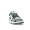 DM8947-100_08 S1 Zapatillas Air Jordan 1 Low Washed Denim GS Azul Blanco DM8947-100