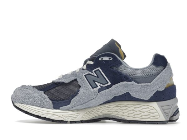 New Balance 2002R Protection Pack Gris Ártico Claro Morado M2002RDI